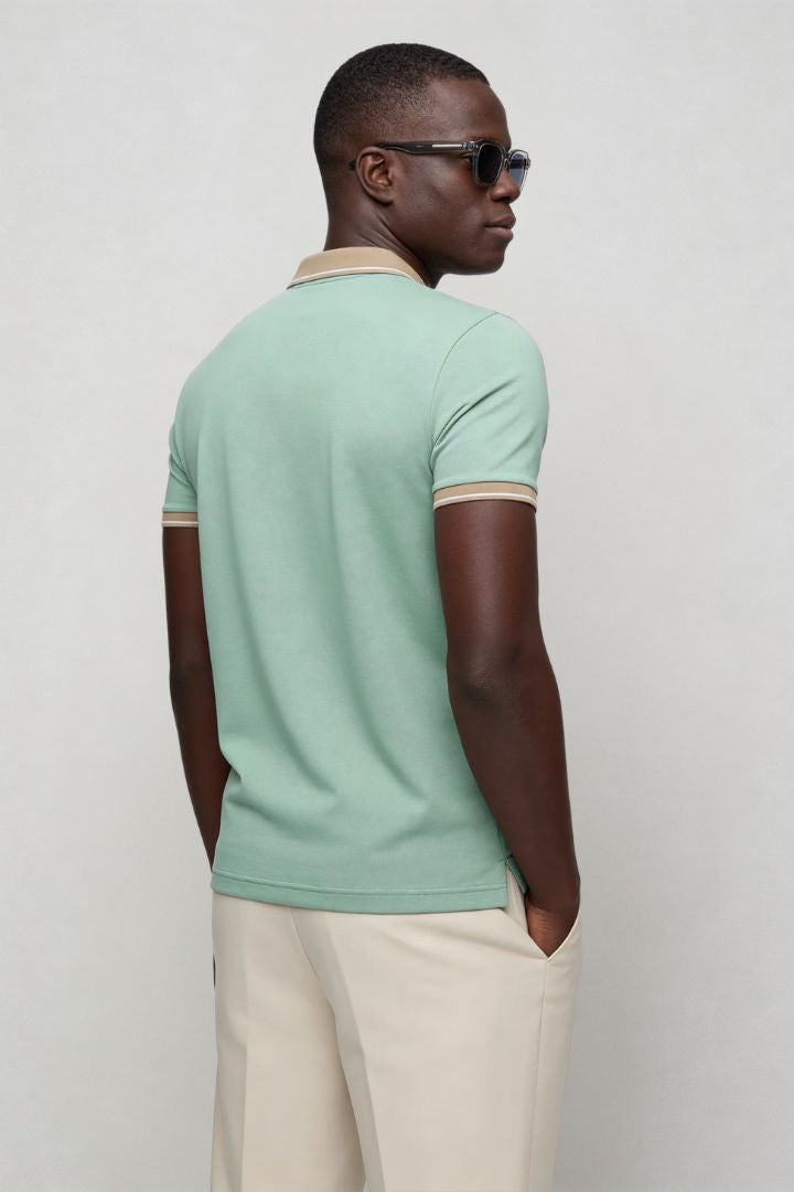 Men’s tailored summer polo shirt with contrast collar and breathable stretch fabric for modern casual style in sage green back view