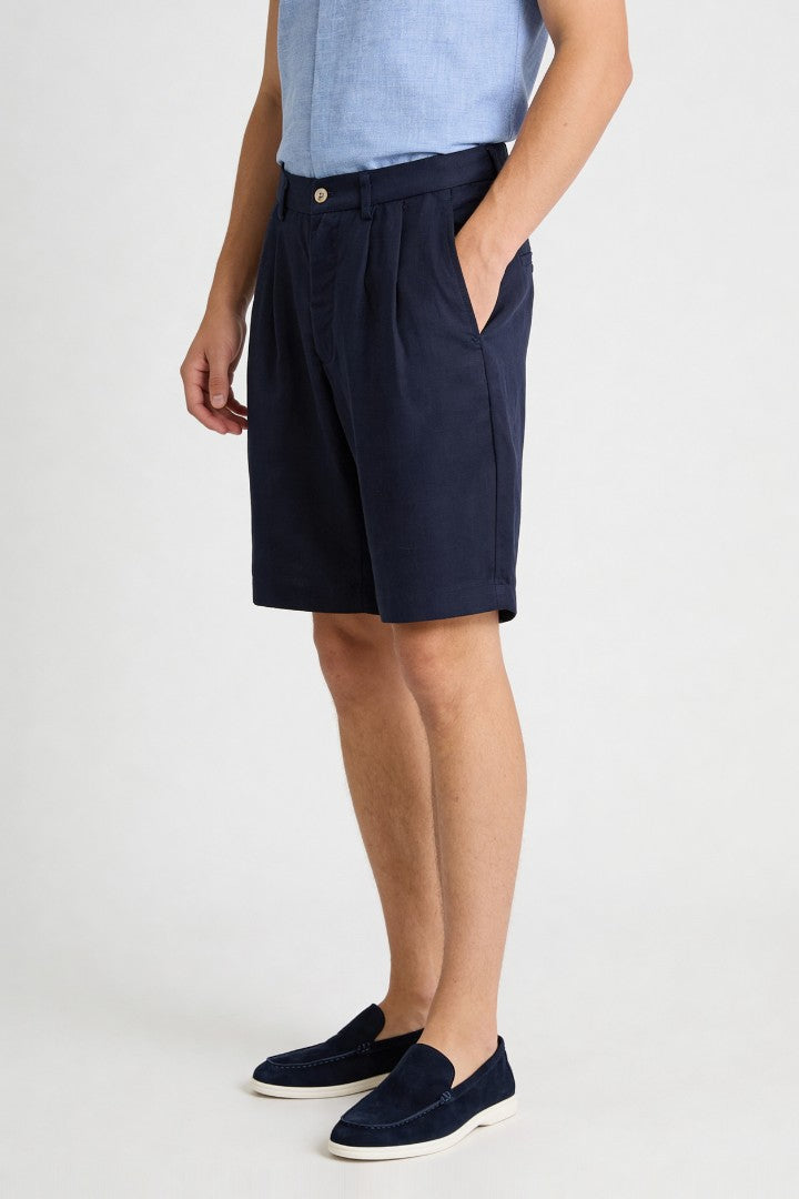 Men’s navy pleated linen shorts in breathable lyocell linen blend with tailored summer fit side view