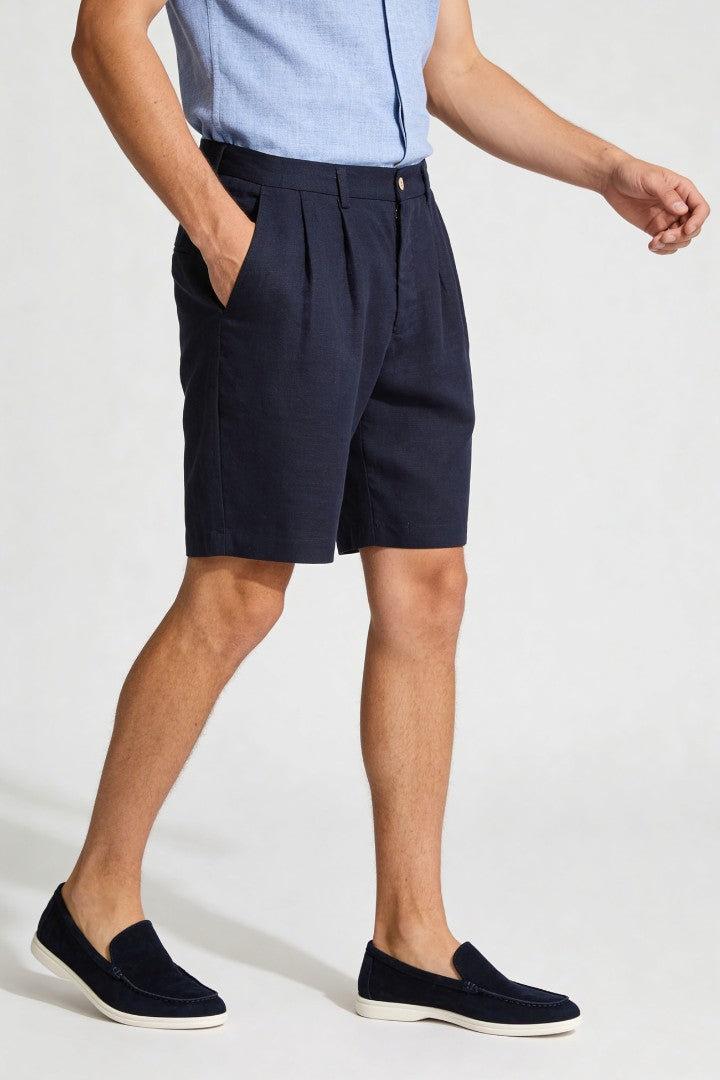 Men’s navy pleated linen shorts in breathable lyocell linen blend with tailored summer fit in motion