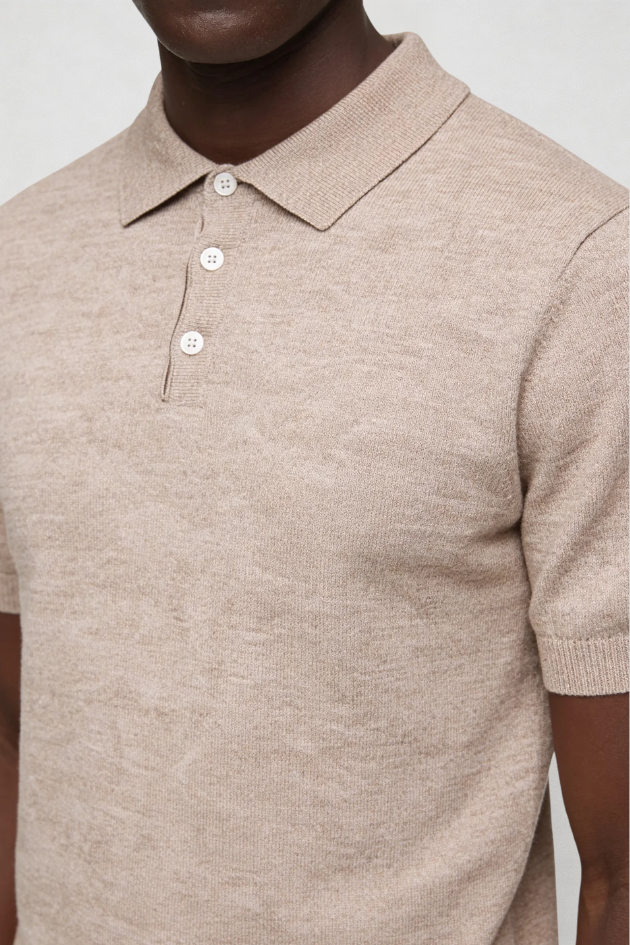 Men’s knit polo shirt cotton blend breathable lightweight modern fit short sleeve polo close-up beige