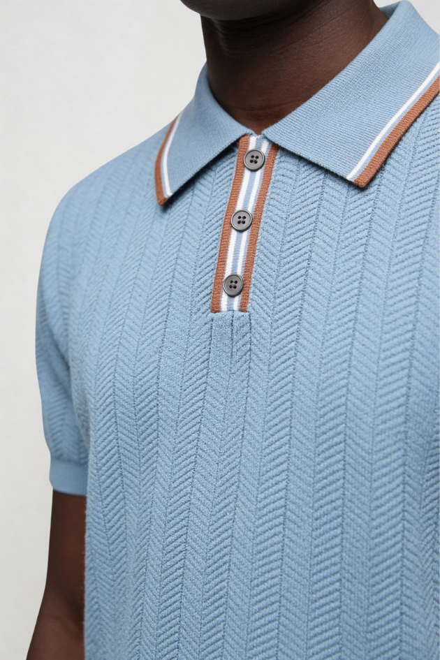 Men’s blue knit polo shirt breathable viscose lightweight summer polo textured short sleeve shirt close-up