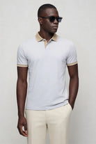 Men’s tailored summer polo shirt with contrast collar and breathable stretch fabric for modern casual style in gray front view