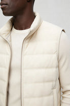 mens white down puffer vest lightweight insulated gilet close-up