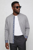 mens light gray knit button cardigan sweater casual layering side pose
