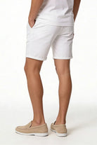 Men’s white cotton chino shorts with tailored fit designed for breathable summer comfort back view