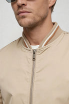 Kingsley Lightweight Zip Jacket – Beige Polyester Bomber – Contrast Rib Detail – Modern Fit – Close-up View
