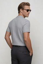 Men's waffle knit half-zip t-shirt with textured cotton blend fabric and modern tailored fit, refined casual menswear essential in gray  back view