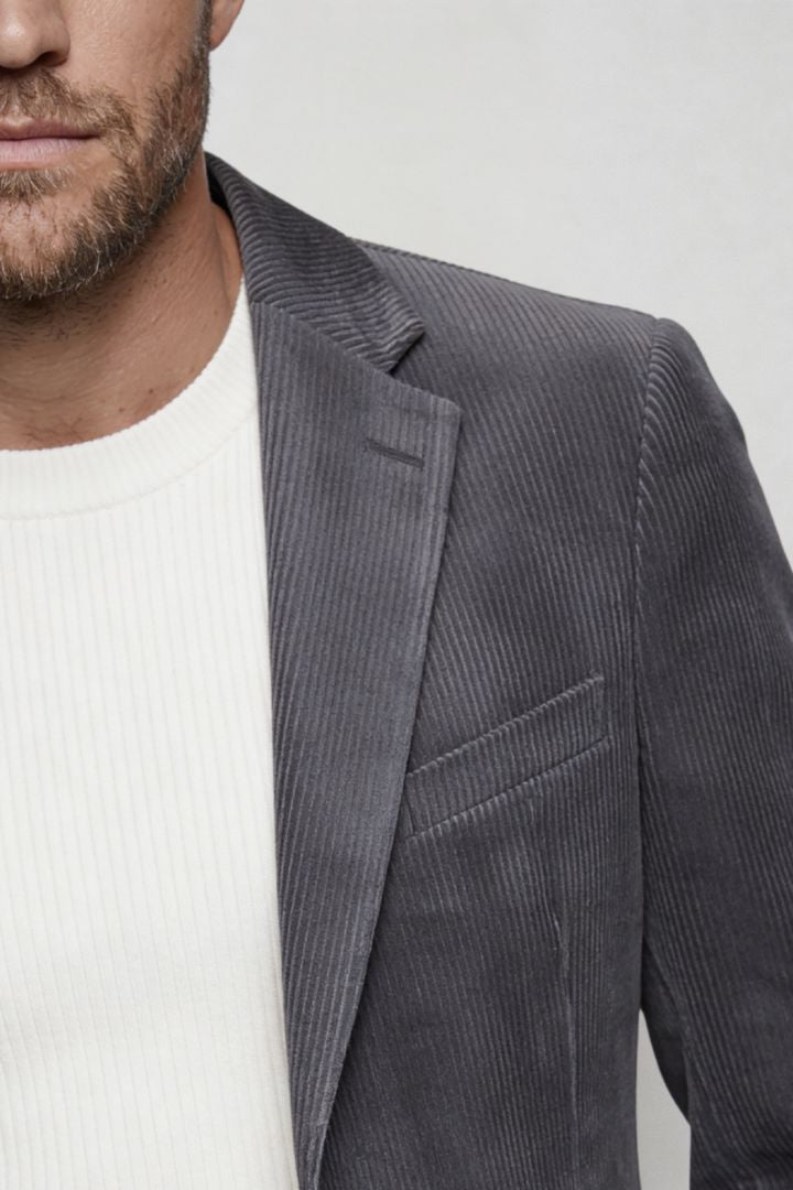 Lavencio Men’s slim fit gray corduroy blazer with notch lapel and two-button closure close-up