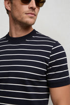 Lavencio Men’s slim fit textured cotton knit short sleeve t-shirt in navy close-up