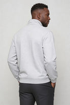 Men’s navy quarter zip cotton sweater with tailored slim fit and metal zipper detail back