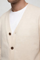 men's cream wool v neck cardigan sweater close-up view