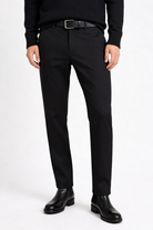 Modal posing with a black tailored stretch trouser of Lavencio