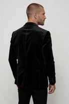 Lavencio Men’s slim fit black corduroy blazer with notch lapel and two-button back pose