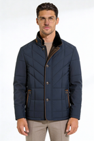 Man wearing the Revington quilted jacket with lightweight insulation and a clean, structured fit for everyday wear