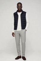 mens navy down puffer vest lightweight insulated gilet in full Lavencio outfit.